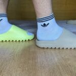 Yeezy Slide Glow Green on feet, photo by Reddit user u/ZeligD