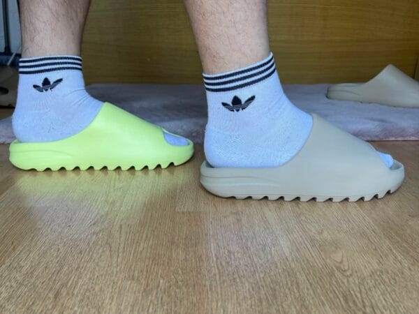 Yeezy Slide Glow Green on feet, photo by Reddit user u/ZeligD